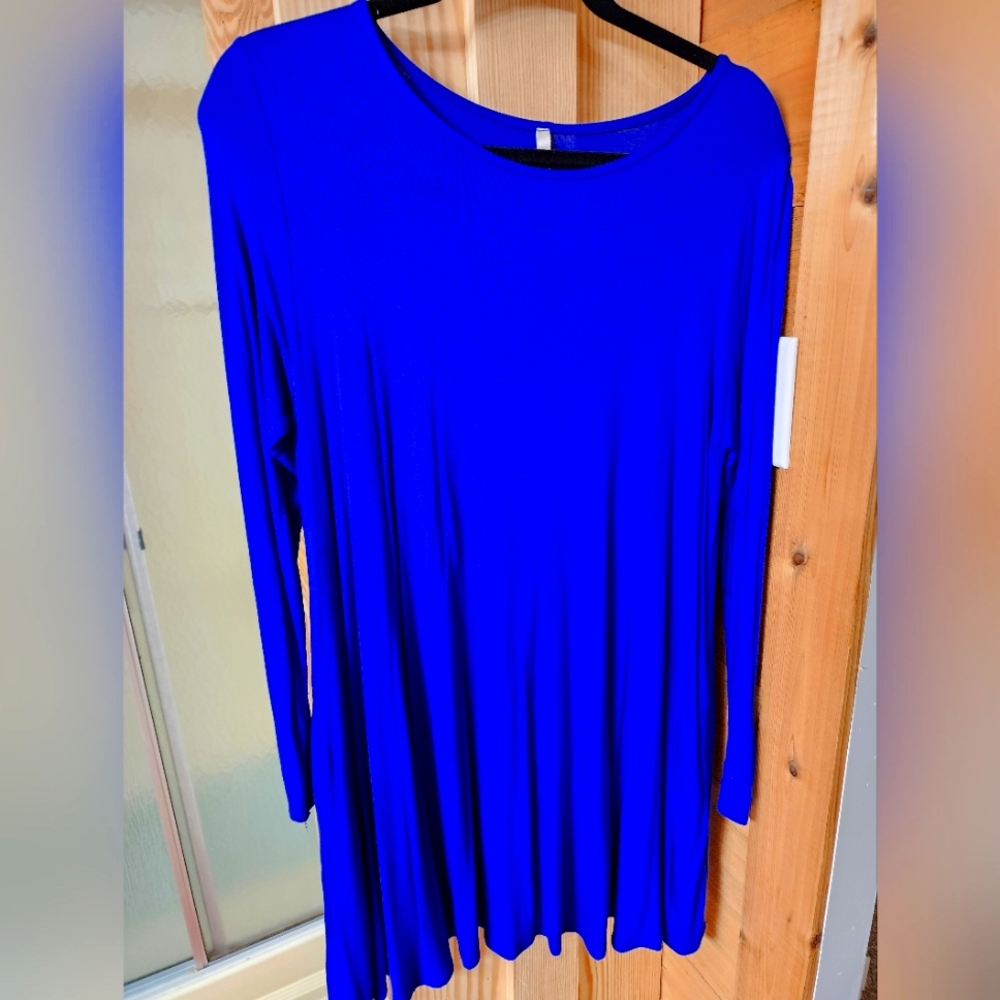 Ladies Medium Swing dress  with pockets, very comfortable.